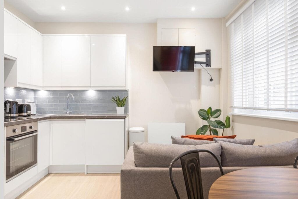 Modern kitchen and living area in a London property managed by a holiday lets agency, ideal for residential lettings. MX Lettings Property Managers London